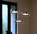 Suspension AURA en verre et laiton, lumière chaude, Lumora Paris