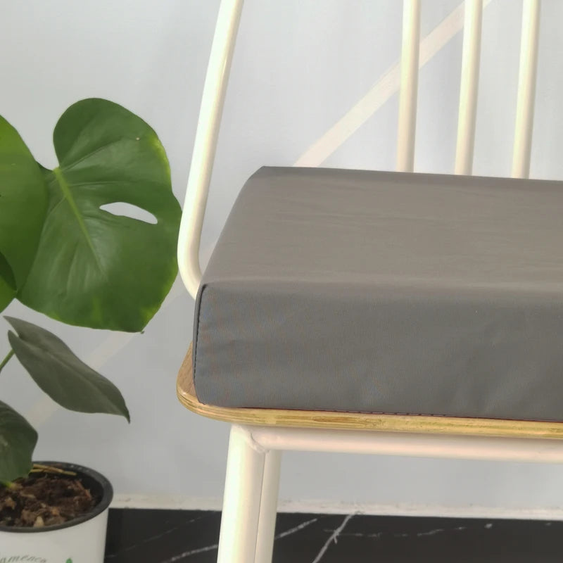 GALETTE — Épaisseur de la galette de chaise grise vue de côté sur l'assise