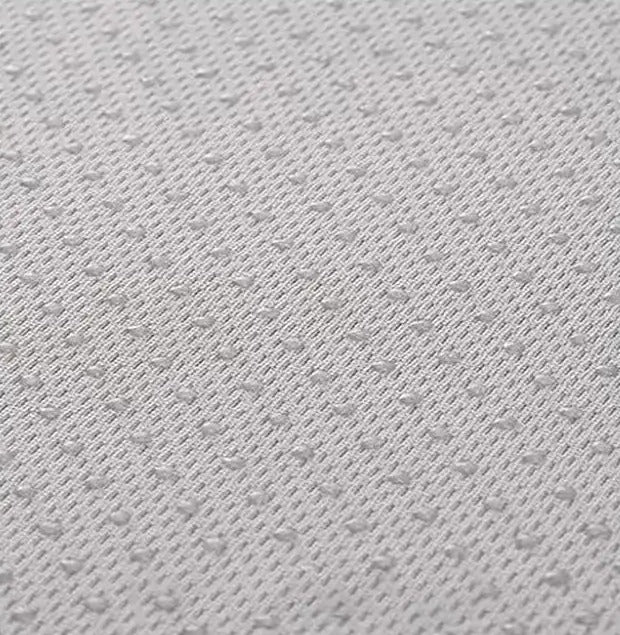 BANQUETTE — Détail de la face inférieure à picots du coussin de banc