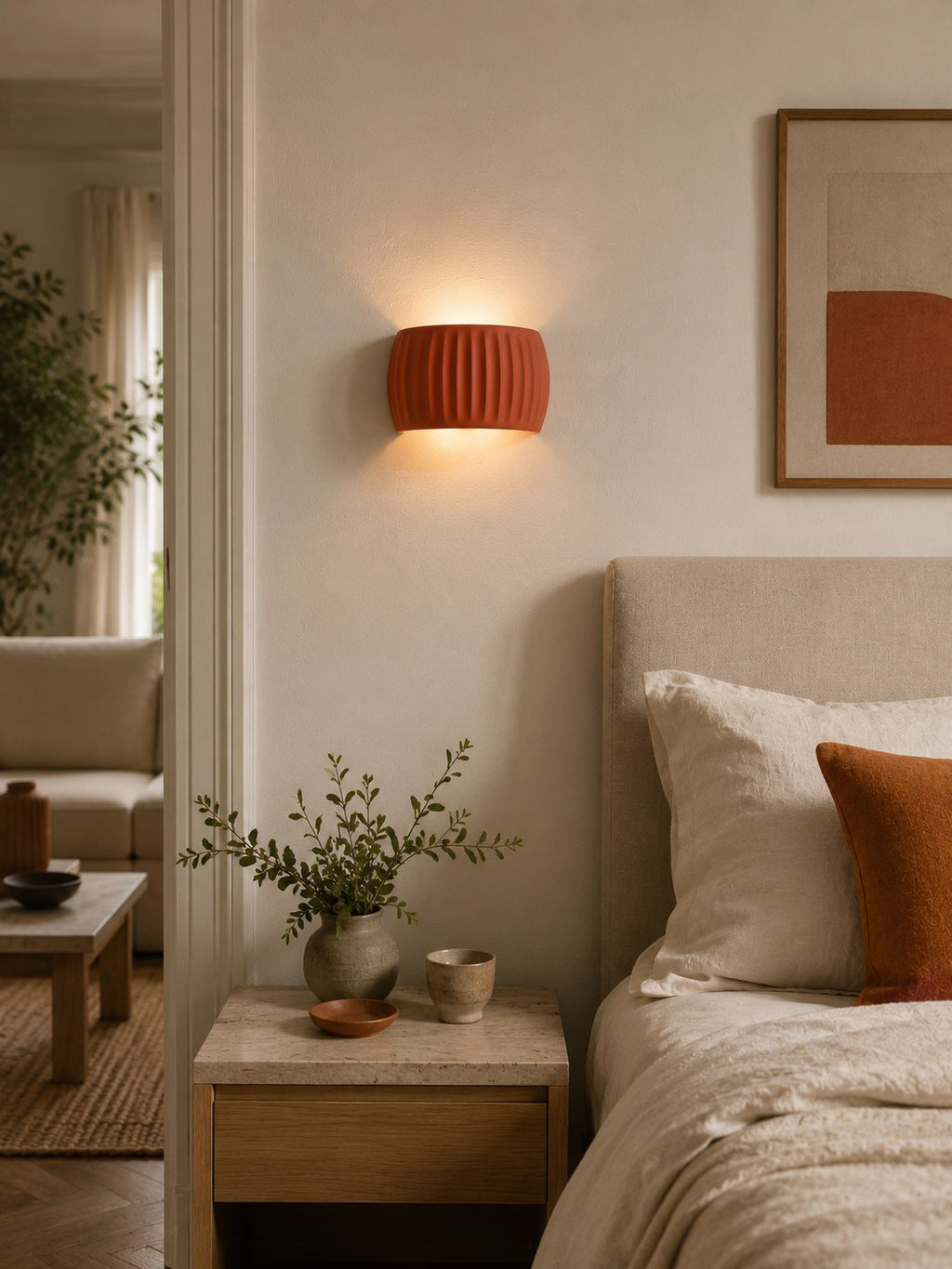 Applique murale ROSACE orange terracotta dans une chambre chaleureuse