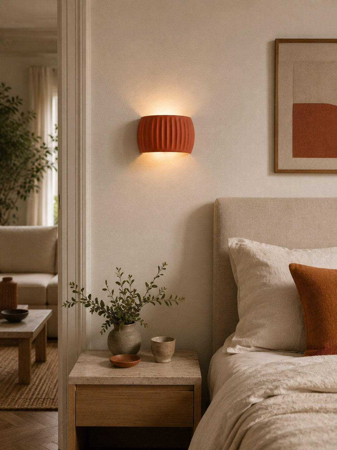 Applique murale ROSACE orange terracotta dans une chambre chaleureuse